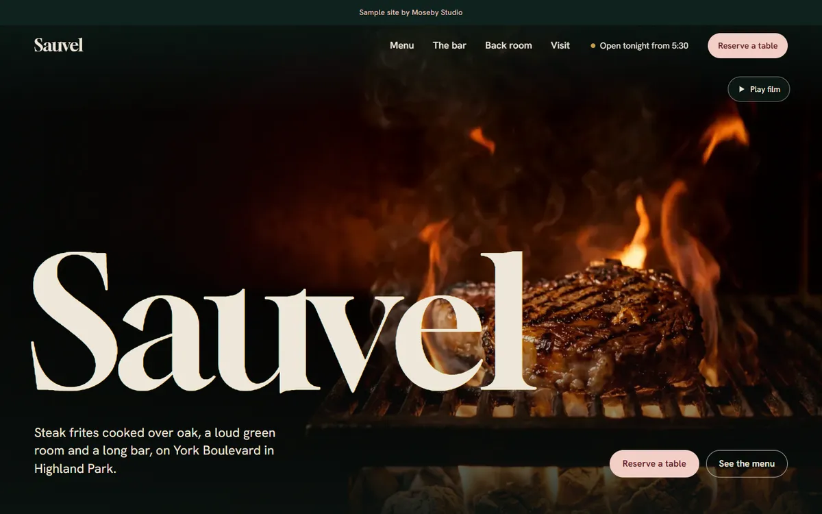 Sauvel concept site: a steak on a wood-fired grill in the flames behind the restaurant's name in large serif type.